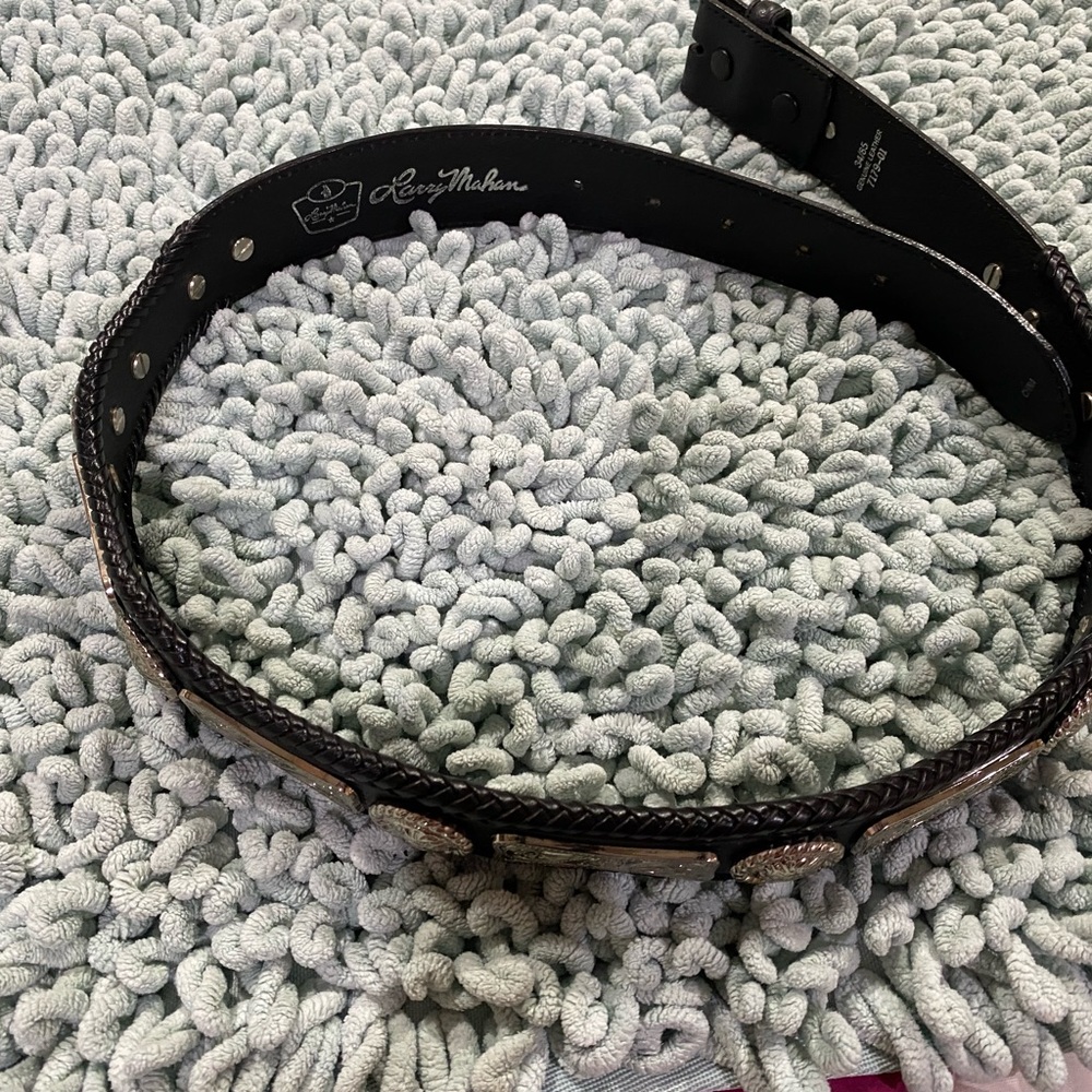 Larry Mahane black western belt with silver concho’s